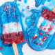 Colorful popsicles in red, white, and blue, perfect for a festive backyard BBQ.