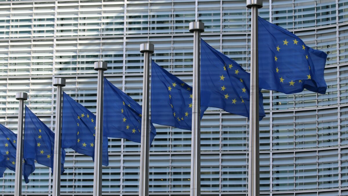 EU flags outside of a building.