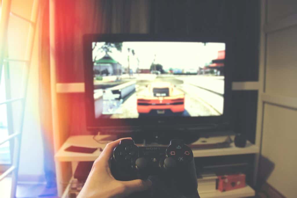A POV of someone playing a Playstation on a tv screen.