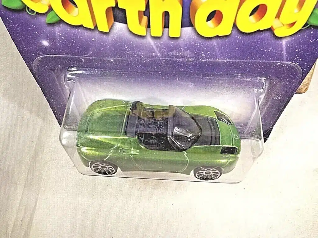 A Tesla Roadster, still in the original packaging, from a model car collection.