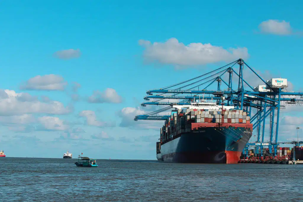 A boat with cargo is shipping to Hawaii.